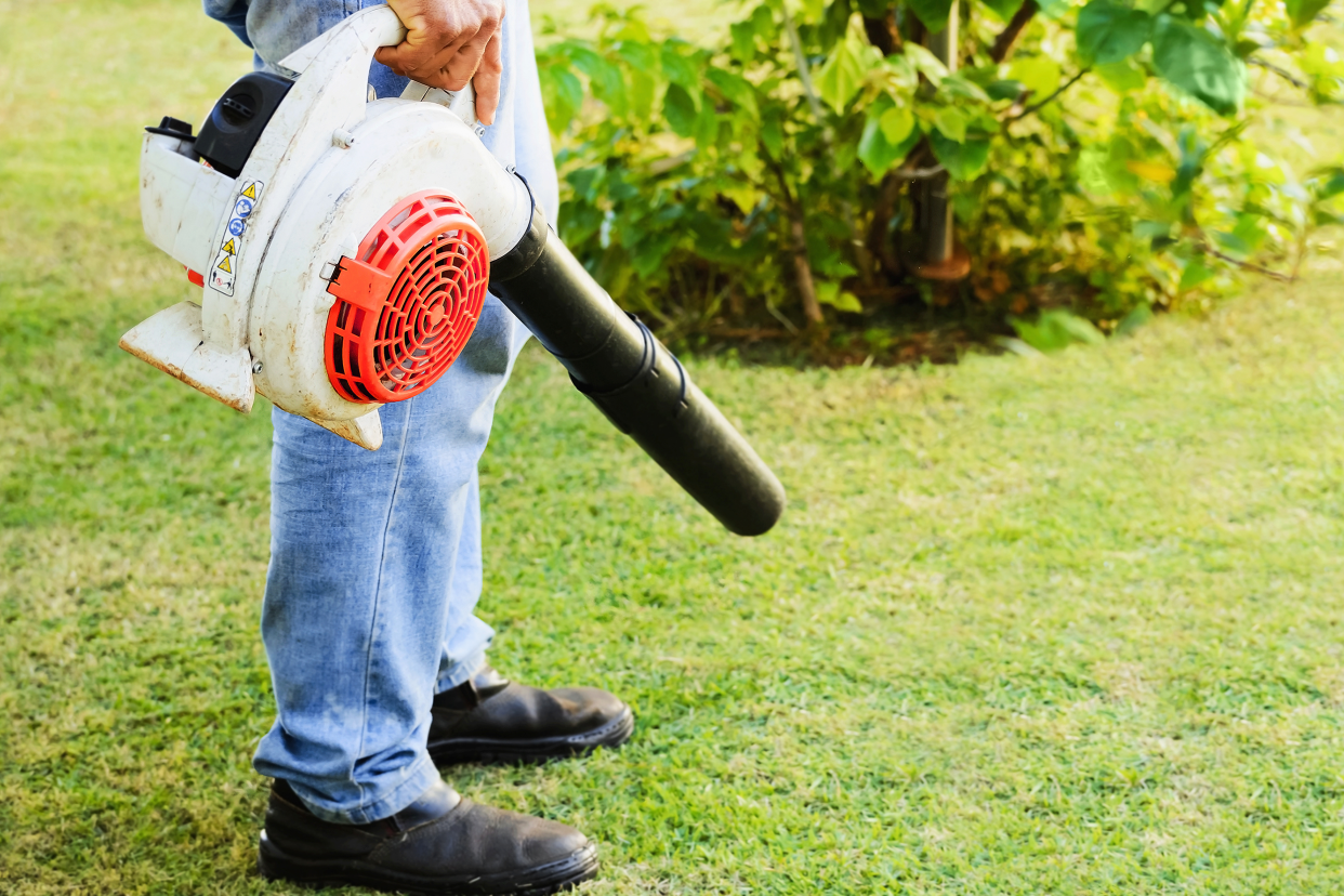 Man holding a leaf blower