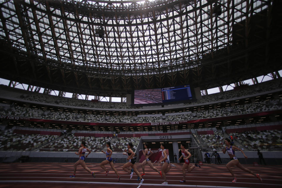 Japanese athletes compete during the women's 800 meter race at an athletics test event for the Tokyo 2020 Olympics Games at National Stadium in Tokyo, Sunday, May 9, 2021. (AP Photo/Shuji Kajiyama)