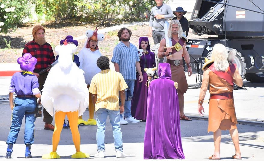 Chris Hemsworth in costume with a sword on his back on the set of a 'Clash Of Clans' commercial in Los Angeles.