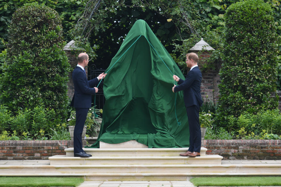 The Duke of Cambridge (left) and Duke of Sussex unveiling a statue they commissioned of their mother Diana, Princess of Wales, in the Sunken Garden at Kensington Palace, London, on what would have been her 60th birthday. Picture date: Thursday July 1, 2021.