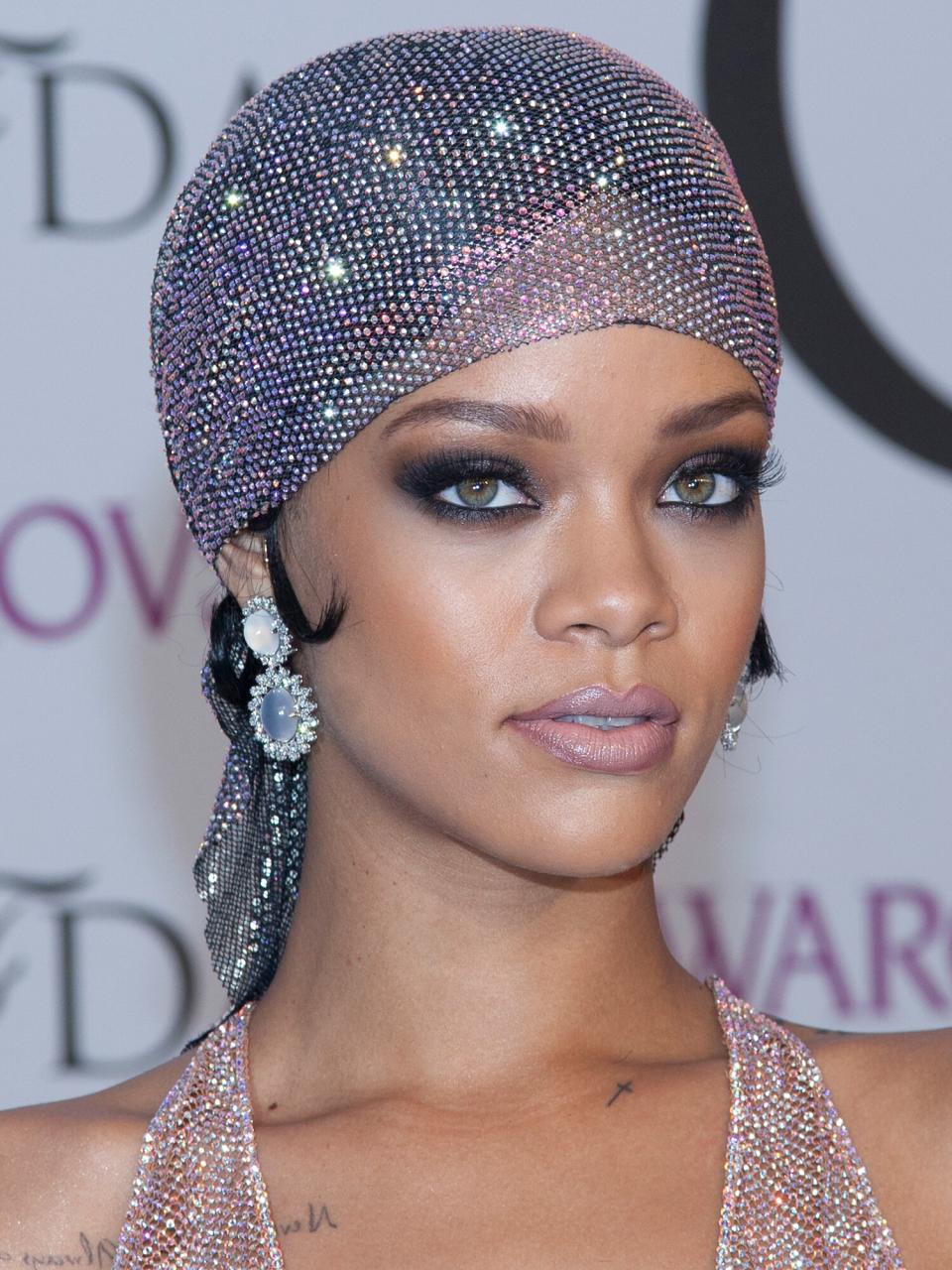 Rihanna attends the "2014 CFDA Fashion Awards" red carpet arrivals at Alice Tully Hall in New York City