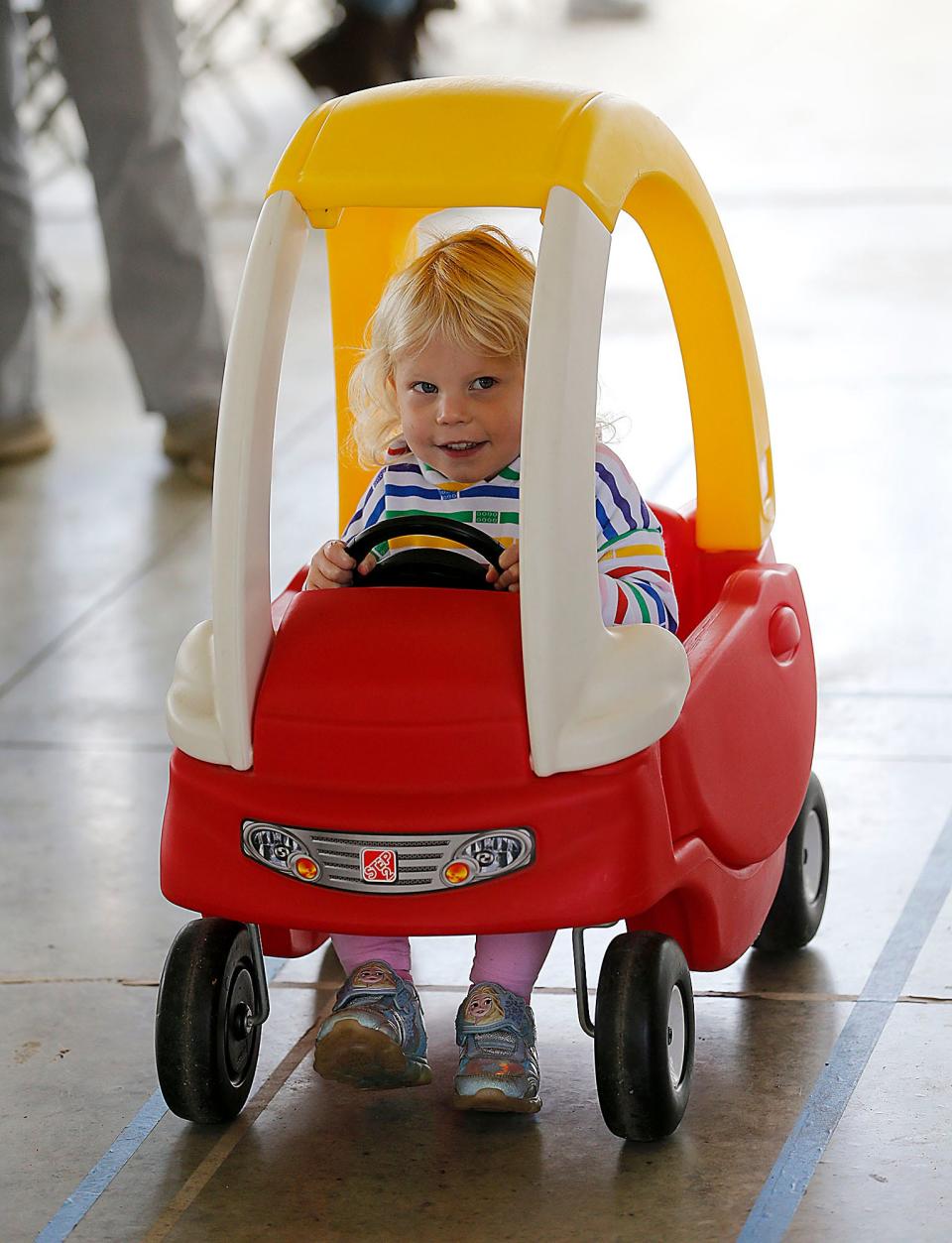 Avery Furrow competes in the Small Fry Car Races at the Ashland County Fair on Friday.