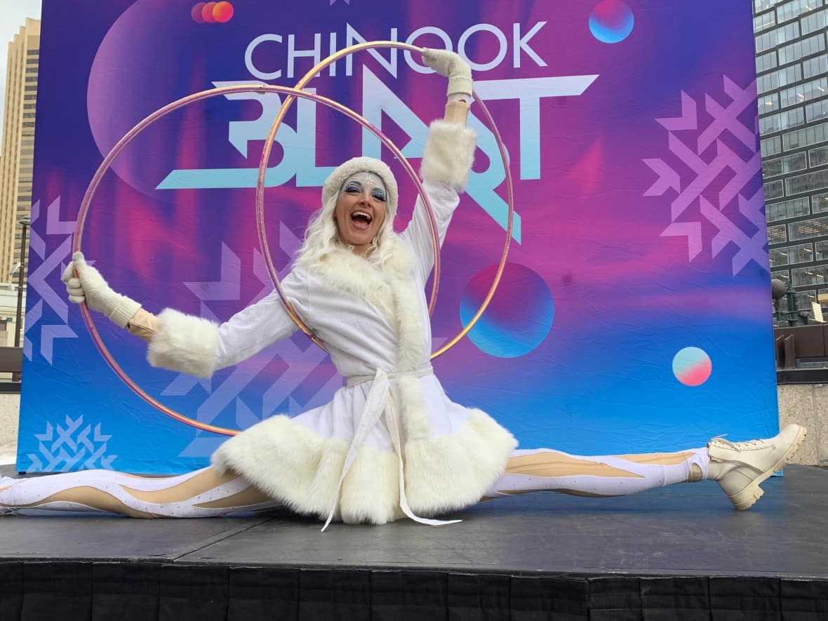 Kate Ryan of The Little Red Ball Company helps celebrate the two-week countdown to Chinook Blast, Calgary's annual winter festival, which begins Jan. 27 and runs to Feb. 12.  (Mike Symington/CBC - image credit)