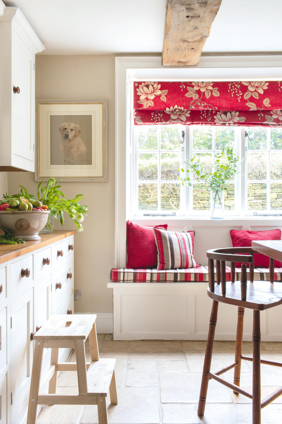 9. Boost kitchen seating with a window seat