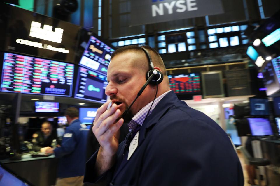 Traders on the floor of he New York Stock Exchange.