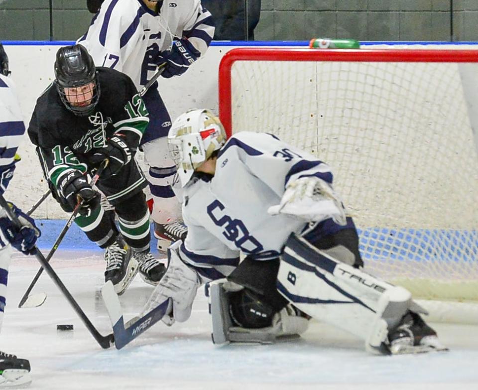 Somerset Berkley’s Brandon Silva blocks a shot from Dartmouth’s John Bicho.