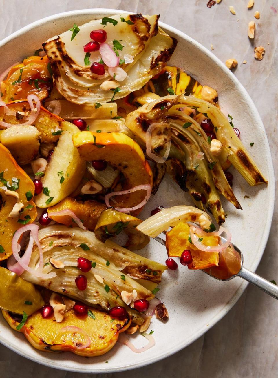 roasted fennel with delicata squash, apples, shallots, hazelnuts, pomegranate seeds, and parsley