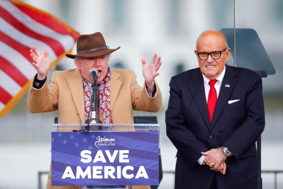 Chapman University law professor John Eastman, next to Rudy Giuliani, gestures as he speaks to Trump supporters in Washington on Jan. 6. (Photo: Jim Bourg / Reuters)