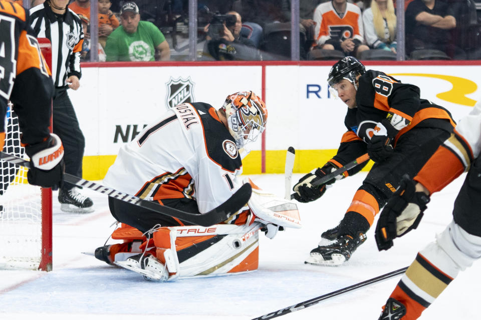 Philadelphia Flyers' Cam Atkinson, right, shots the puck past Anaheim Ducks' Lukas Dostal, left, for a goal during the second period of an NHL hockey game, Saturday, Oct. 28, 2023, in Philadelphia. (AP Photo/Chris Szagola)