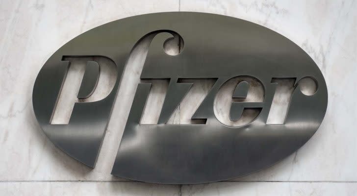 Pfizer logo on metal placard with marble backdrop