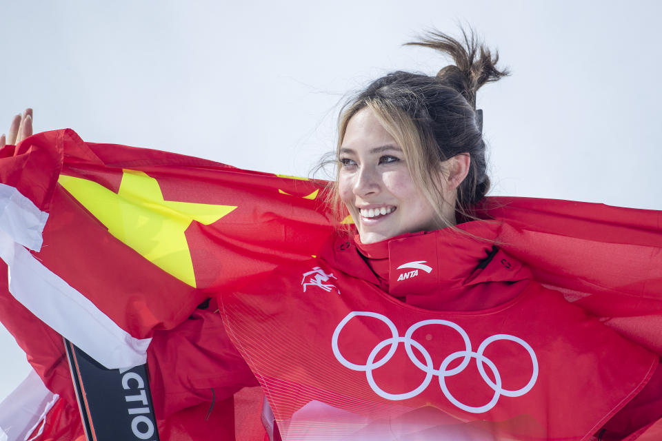 Seen here, China's freestyle skier Eileen Gu poses after winning a silver medal at the Winter Olympics. 