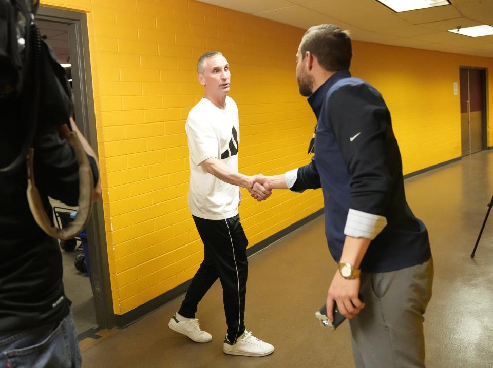 ASU head basketball coach Bobby Hurley shakes hands after a news conference on his contract and next year's team at Desert Financial Arena in Tempe on March 28, 2023.