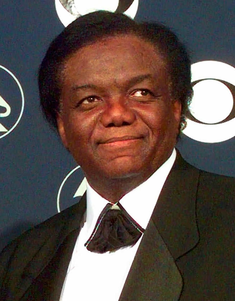 Songwriter/producer Lamont Dozier appears at the 40th Annual Grammy Awards in New York on Feb. 25, 1998. Dozier, of the celebrated Holland-Dozier-Holland team that wrote and produced “You Can’t Hurry Love,” “Heat Wave” and dozens of other hits and helped make Motown an essential record company of the 1960s and beyond, has died at age 81.