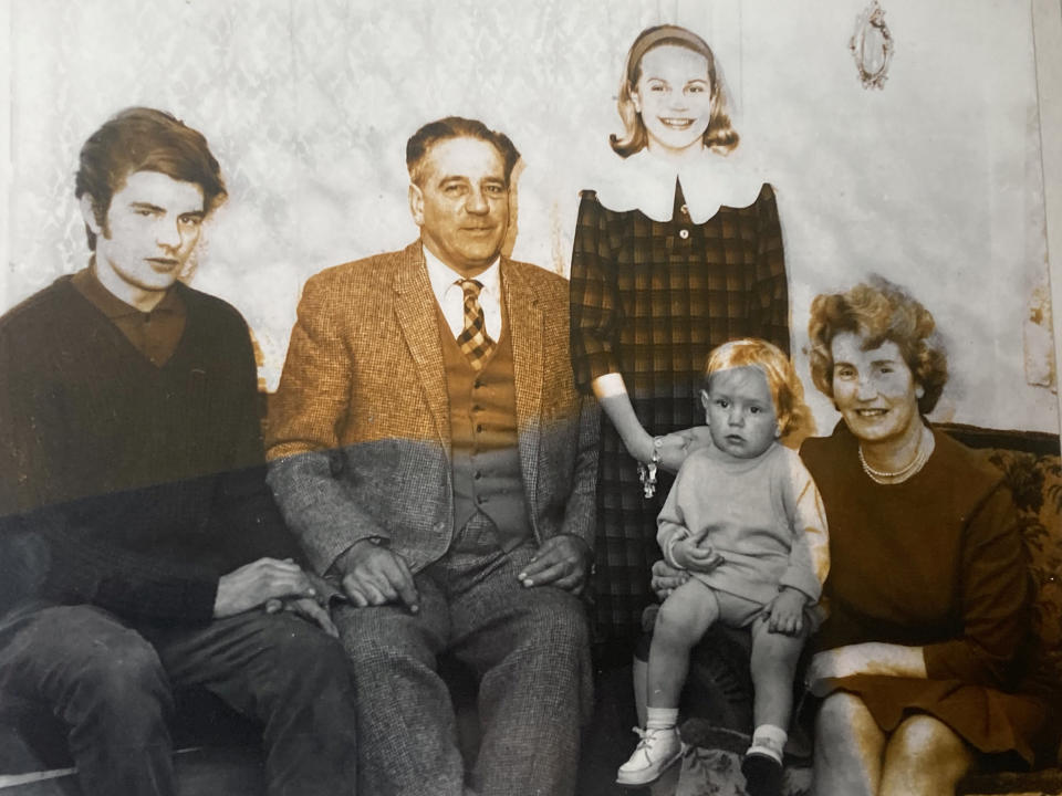 Joan, pictured far right, with her husband Granville, second left, and their children. (Joan Prince/SWNS)