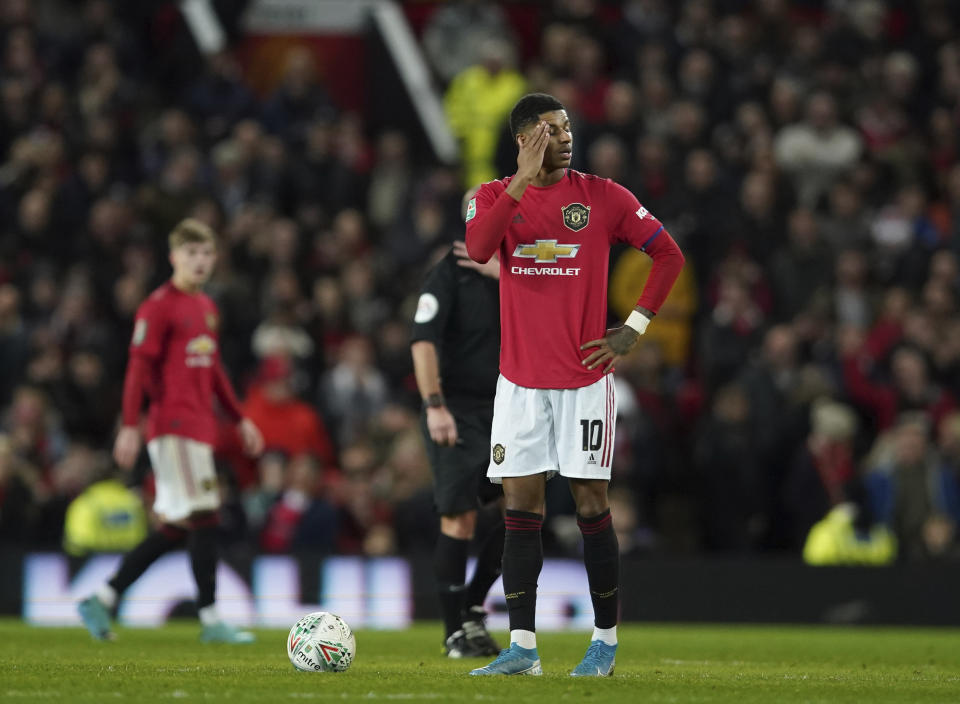 Manchester United's Marcus Rashford waits to restart after Manchester City scored their third goal of the game during the English League Cup semifinal first leg soccer match between Manchester United and Manchester City and at Old Trafford, Manchester, England, Tuesday, Jan. 7, 2020. (AP Photo/Jon Super)