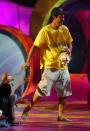 <p>Sandler accepted his Kids’ Choice Award sans shoes. (Photo: Frank Micelotta/Getty Images)</p>
