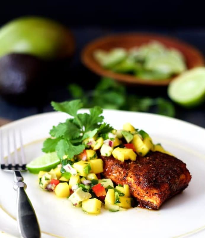 <p>From A Chef's Kitchen</p><p>For this Blackened Halibut with Mango and Avocado Salsa, the lightly charred crust that results from “blackening” creates a pleasant contrast to this mild, flaky fish.</p><p><strong>Get the recipe: <a href="https://www.fromachefskitchen.com/blackened-halibut-with-mango-and-avocado-salsa/" rel="nofollow noopener" target="_blank" data-ylk="slk:Blackened Halibut with Mango-Avocado Salsa;elm:context_link;itc:0;sec:content-canvas" class="link rapid-noclick-resp">Blackened Halibut with Mango-Avocado Salsa</a></strong></p>