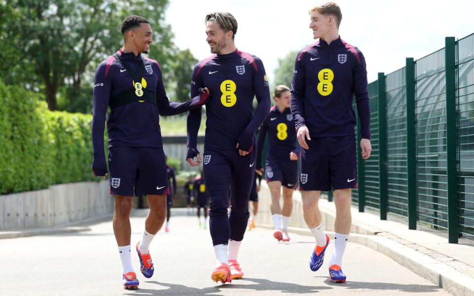 Jack Grealish alongside Trent Alexander-Arnold and Anthony Gordon before England training