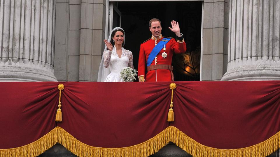 PHOTO: Their Royal Highnesses Prince William, Duke of Cambridge and Catherine, Duchess of Cambridge wave on the balcony at Buckingham Palace during the Royal Wedding in London, England, April 29, 2011. (John Stillwell/WPA Pool/Getty Images)