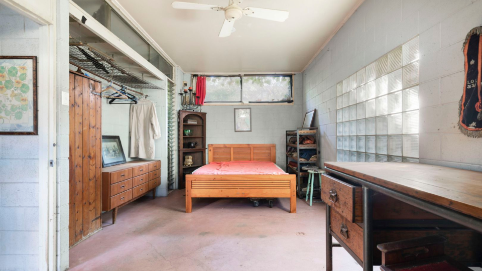 The bedroom of the dilapidated home in Redfern.