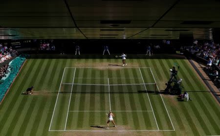 Tennis - Wimbledon - All England Lawn Tennis and Croquet Club, London, Britain - July 10, 2018 Italy's Camila Giorgi in action during her quarter final match against Serena Williams of the U.S. REUTERS/Andrew Couldridge