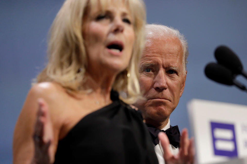 Former Vice President Joe Biden listens to his wife Jill Biden as she addresses the Human Rights Campaign dinner in Washington, D.C., last year. (Yuri Gripas/Reuters)