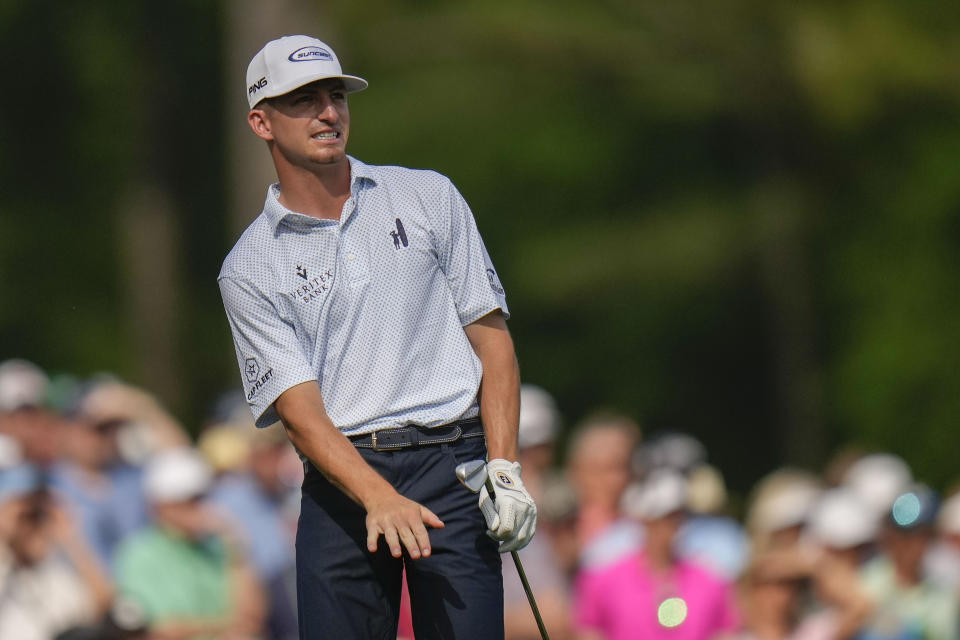 Sam Bennett watches his tee shot on the 12th hole during the first round of the Masters golf tournament at Augusta National Golf Club on Thursday, April 6, 2023, in Augusta, Ga. (AP Photo/Jae C. Hong)