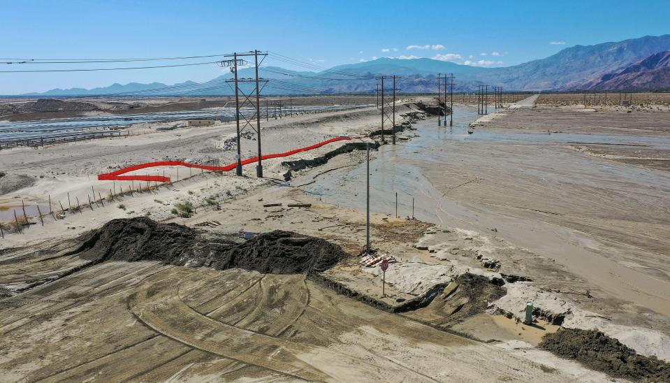 Indian Canyon Dr. remains closed as it is covered in mud and water from the rains from Tropical Storm Hilary in Palm Springs, Calif., August 22, 2023.