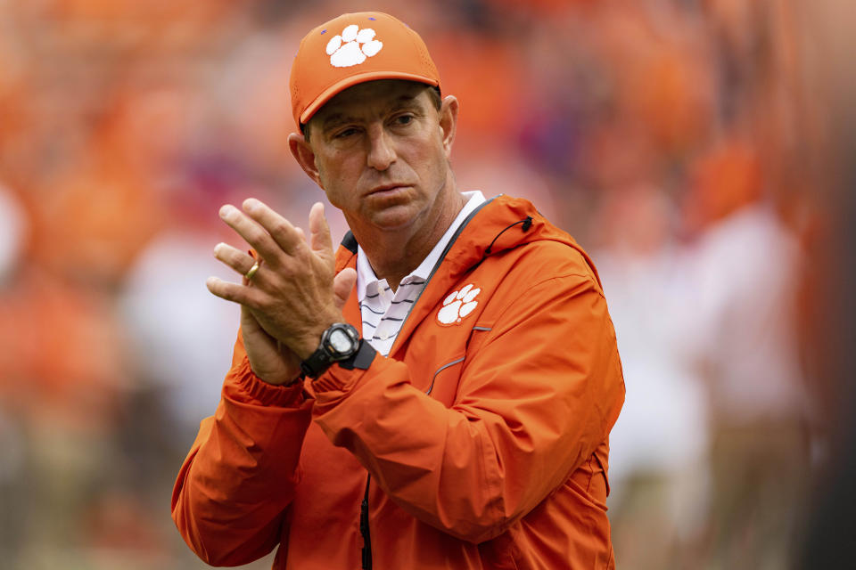 Clemson Tigers head coach Dabo Swinney looks on during warm ups before an NCAA college football game against the Furman Paladins in Clemson, S.C., Saturday, Sept. 10, 2022. (AP Photo/Jacob Kupferman)