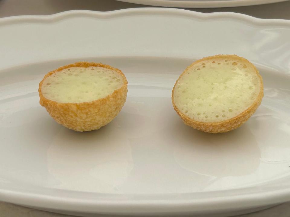 bread half spheres on oval plate