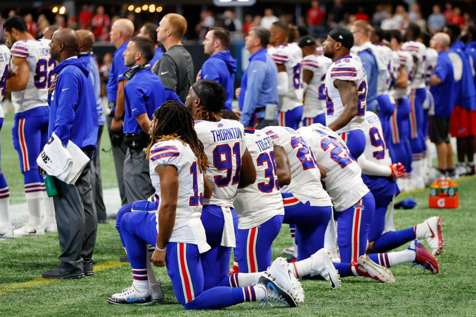 <p>Buffalo Bills players kneel during the national anthem prior to the first half against the Atlanta Falcons at Mercedes-Benz Stadium on October 1, 2017 in Atlanta, Georgia. (Photo by Kevin C. Cox/Getty Images) </p>