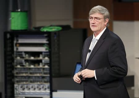 Intel executive vice president and general manager of the technology and manufacturing group Bill Holt speaks during an investors conference in Santa Clara, California, November 20, 2014. REUTERS/Beck Diefenbach