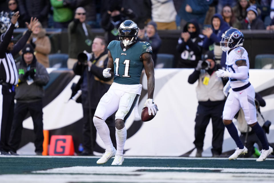 Philadelphia Eagles' A.J. Brown scores a touchdown against the Tennessee Titans during the second half of an NFL football game, Sunday, Dec. 4, 2022, in Philadelphia. (AP Photo/Matt Rourke)