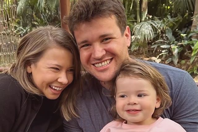 <p>Bindi Irwin Instagram</p> Bindi Irwin and husband Chandler Powell with daughter Grace