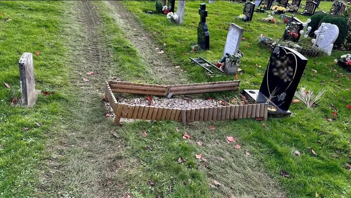 A grave damaged by track marks  (Alastair Chambers )