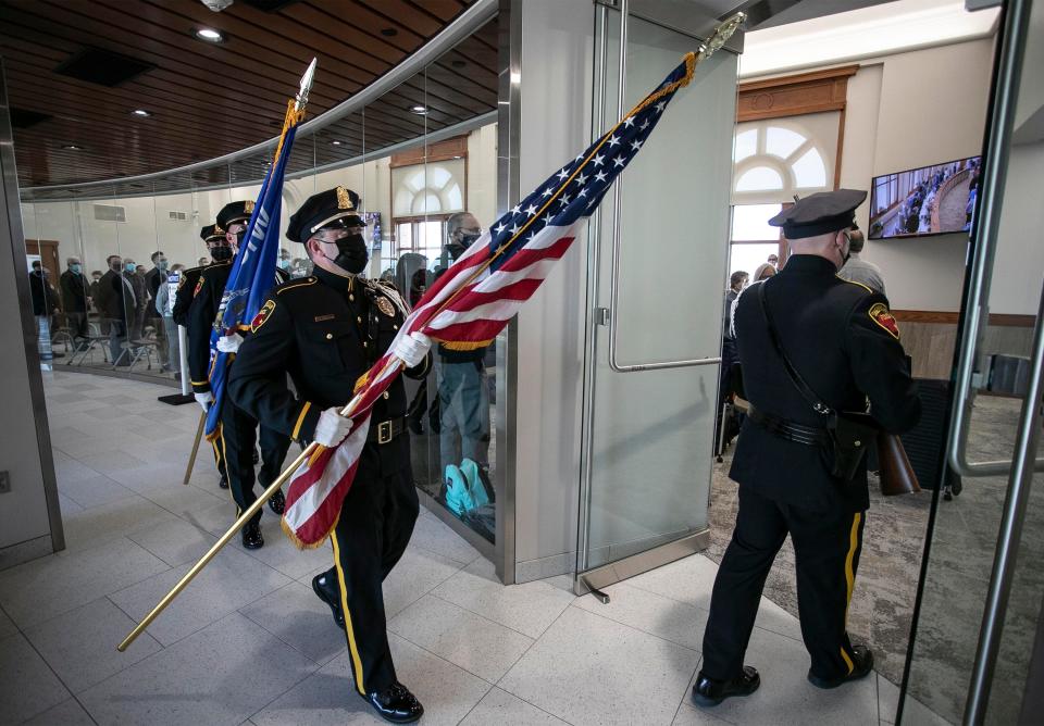 The Sheboygan Police color guard march into the council chambers before the swearing in of elected officials, Tuesday, April 20, 2021, in Sheboygan, Wis.