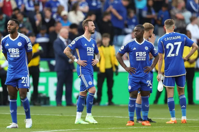 James Maddison of Leicester City and teammates dejected after Leicester City are relegated from the Premier League after the Premier League match between Leicester City and West Ham United at The King Power Stadium on May 28, 2023 in Leicester, United Kingdom.