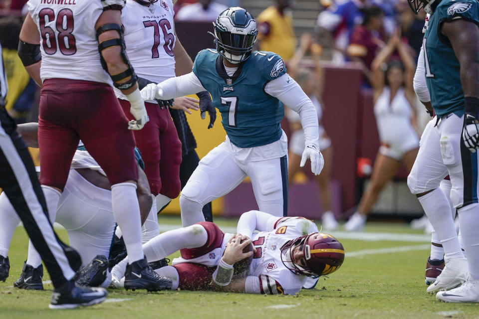 Philadelphia Eagles linebacker Haason Reddick (7) reacts after sacking Washington Commanders quarterback Carson Wentz (11). (AP Photo/Alex Brandon)