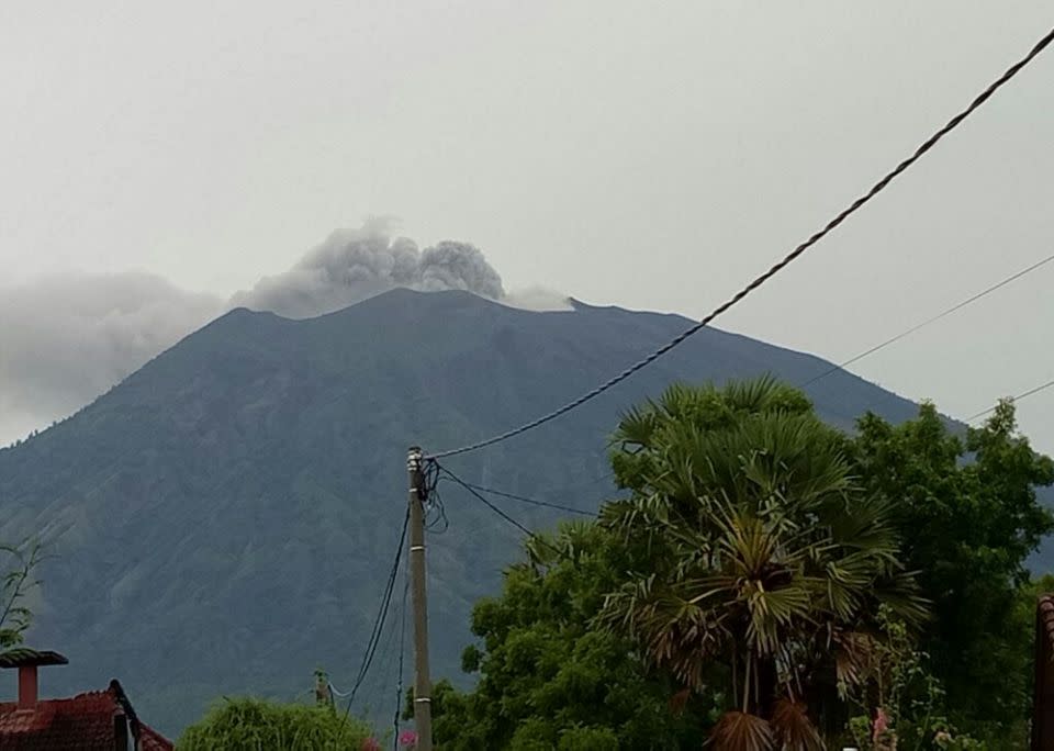 A black ash cloud rises from the top of the volcano. Source: 7 News