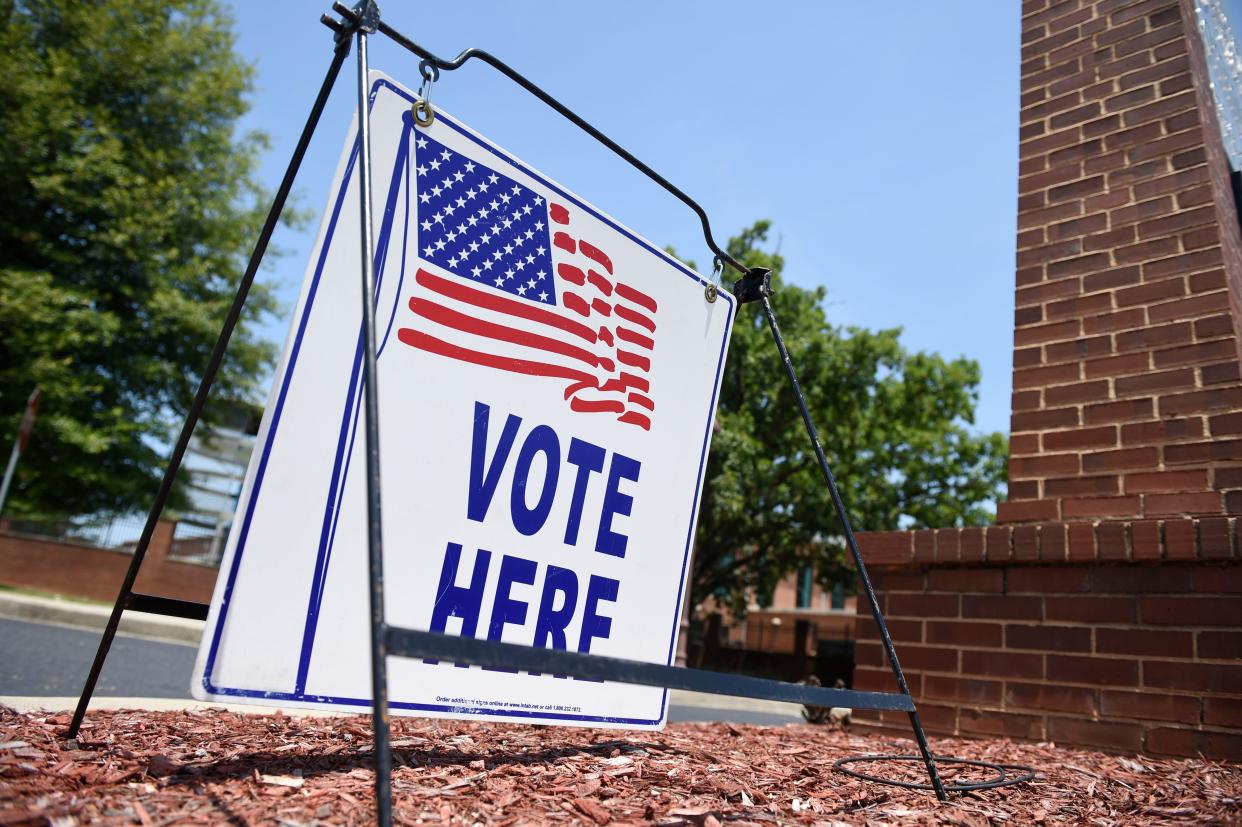 Vote Here sign outside a polling location. There are 29 polling locations in Saline County for the 2022 general election.