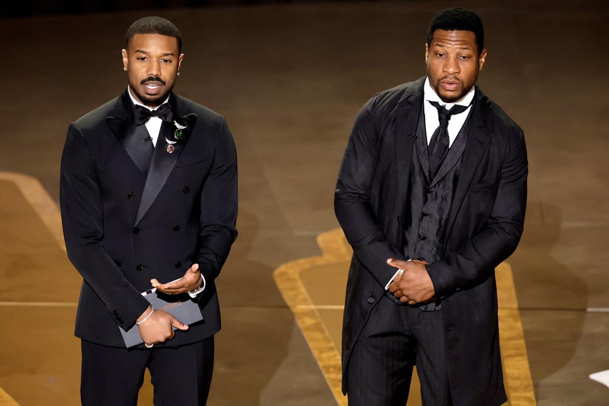 Michael B. Jordan and Jonathan Majors speak onstage during the 95th Annual Academy Awards at Dolby Theatre on March 12, 2023 in Hollywood, California.