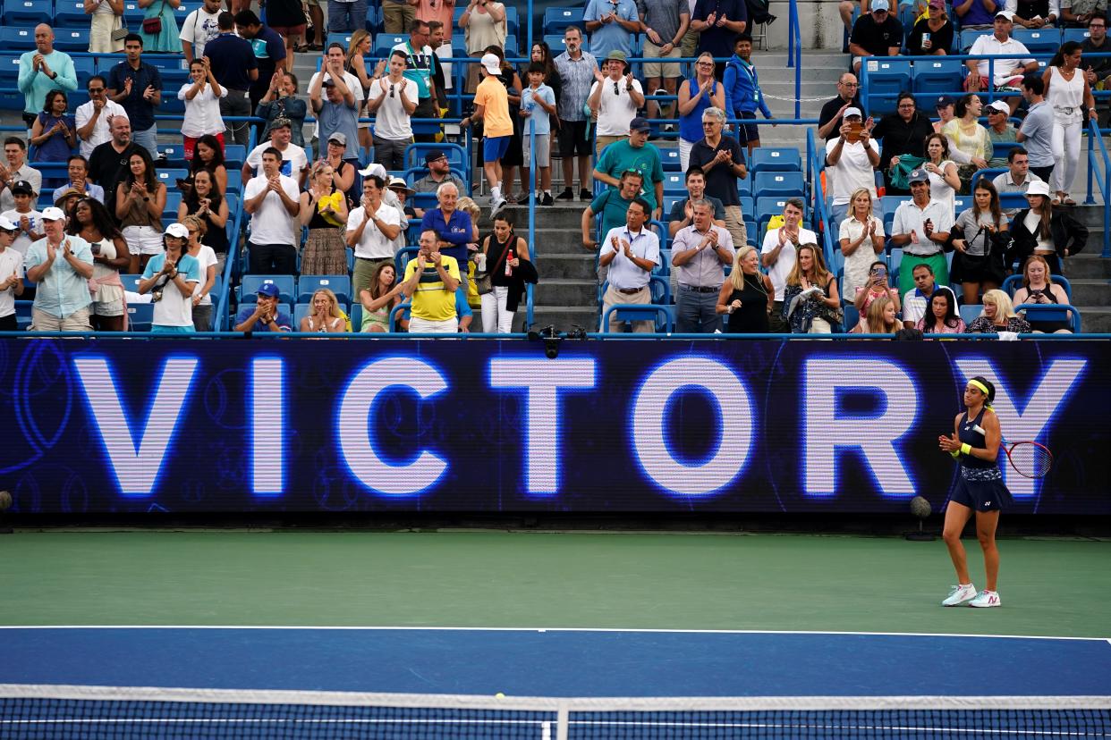 Caroline Garcia, of France, celebrates her semifinal win against Aryna Sabalenka, of Belarus, during a semifinal match of the Western & Southern open tennis tournament, Saturday, Aug. 20, 2022, at the Lindner Family Tennis Center in Mason, Ohio.