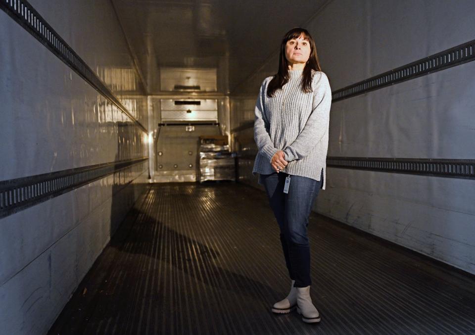 Heidi Cannella, communications director for the Utah Food Bank, poses inside a trailer that is about to be loaded with food as she talks about the product they have and the items they have for those that need it at their South Salt Lake City warehouses on Thursday, Dec. 28, 2023. | Scott G Winterton, Deseret News