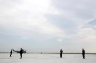 <p>Secret service officers stand as U.S. President Barack Obama leaves, enroute to his Hiroshima trip, at Chubu Centrair International Airport in Tokoname, Japan May 27, 2016. (Photo: Carlos Barria/Reuters) </p>