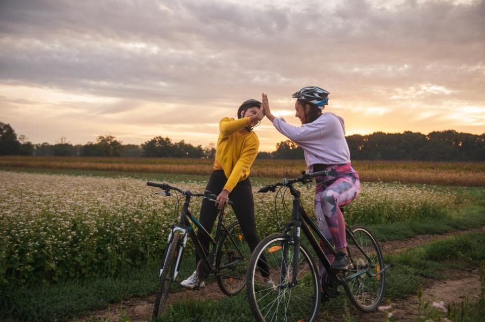 Working out with a friend might help you to hit the gym more frequently, according to new research. Getty Images