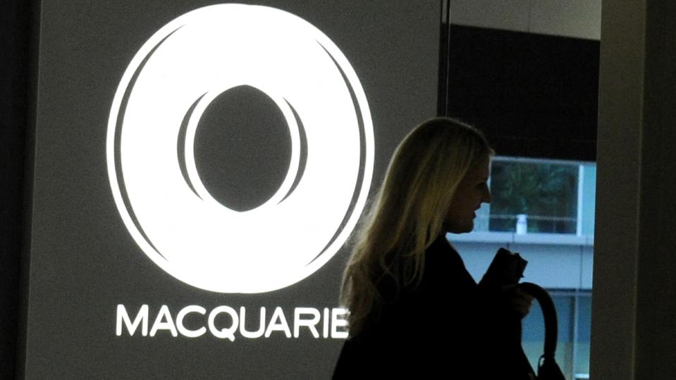 The circular logo of Macquarie Bank adorns the foyer as Australia's biggest investment bank announces a full-year net profit of 1.04 billion USD in Sydney on April 29, 2011. Macquarie Group Ltd's net profit, down nine percent on the previous financial year, was broadly in line with expectations given subdued equity market conditions.  AFP PHOTO / Torsten BLACKWOOD (Photo by TORSTEN BLACKWOOD / AFP) (Photo by TORSTEN BLACKWOOD/AFP via Getty Images)