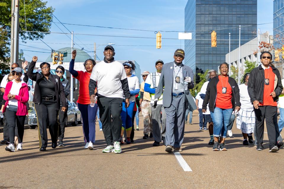 Citizens from throughout Jackson walk in the No Prayer, No Peace March to spread prayer in the streets of downtown Jackson on Saturday, Oct. 7, 2023. The march, hosted by the Jackson Police Department, is part of National Faith & Blue Weekend.
