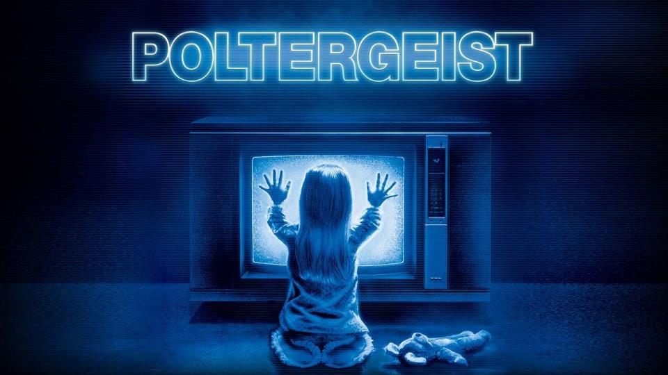 the poster for the classic horror movie poltergeist, which features a young girl touching the static on a tv screen