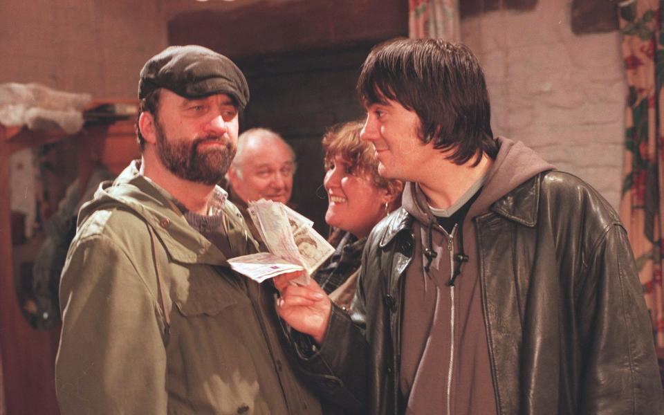 Zak is finally persuaded to sell his barn in 2002: with Lisa and Cain Dingle (Jane Cox and Jeff Hordley)