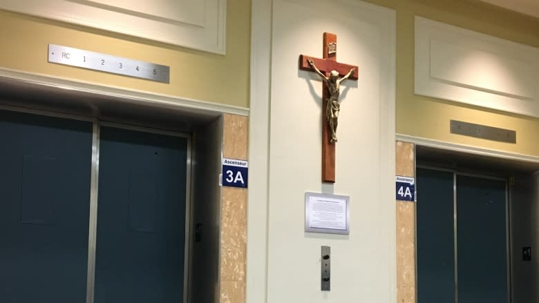 Crucifix restored to wall of Quebec City hospital after thousands object to its removal